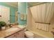 Well-lit bathroom featuring a tub and shower combination and a granite-topped vanity at 17274 Se 85Th Willowick Cir, The Villages, FL 32162