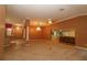 Spacious living room with neutral colors, columns, and chandelier at 17274 Se 85Th Willowick Cir, The Villages, FL 32162