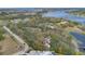 Beautiful aerial shot of homes bordering a lake with mature trees in a residential area at 17561 Seidner Rd, Winter Garden, FL 34787