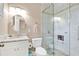 Bathroom features a vanity with granite countertop and a tiled walk-in shower at 17561 Seidner Rd, Winter Garden, FL 34787