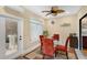 Cozy dining area with a glass-top table and stylish seating, enhanced by natural light and a decorative accent at 17561 Seidner Rd, Winter Garden, FL 34787