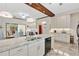 Well-lit kitchen with ample counter space, modern appliances, and a view into the dining area, great for culinary enthusiasts at 17561 Seidner Rd, Winter Garden, FL 34787