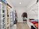 Functional walk-in closet with ample shelving and hanging space for organized storage at 17834 Se 105Th Ave, Summerfield, FL 34491