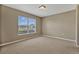 Neutral bedroom with carpet flooring and natural light at 1787 Sunset Ridge Dr, Mascotte, FL 34753