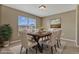 Dining room featuring a wooden table and comfortable chairs at 1787 Sunset Ridge Dr, Mascotte, FL 34753