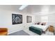 Basement bedroom features modern minimalist decor, a gray tiled floor and white walls at 1930 Hilltop Dr, Mount Dora, FL 32757