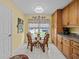 Cozy breakfast nook featuring bright natural light, tiled floor, and built-in cabinetry at 2175 Madero Dr, The Villages, FL 32159