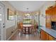 Cozy breakfast nook with bay window providing natural light and views at 21850 Tartan St, Leesburg, FL 34748