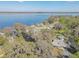 An aerial view of a waterfront community nestled along a serene lake at 2439 Cr 453, Lake Panasoffkee, FL 33538