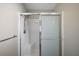 Shower with glass doors and shower head at 2541 Privada Dr, The Villages, FL 32162