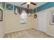 Comfortable, carpeted bedroom featuring a window, closet and modern ceiling decor at 303 White Water Bay Dr, Groveland, FL 34736