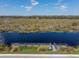 Community dock offers serene water access and natural views at 303 White Water Bay Dr, Groveland, FL 34736