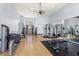 Well-equipped fitness center with modern weightlifting machines and hardwood floors at 303 White Water Bay Dr, Groveland, FL 34736