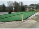 Well-maintained bocce ball court with seating and easy access to parking at 313 Westwood Dr, Leesburg, FL 34748