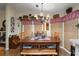 Inviting dining room with a rustic table set, perfect for Gathering meals and entertaining guests at 313 Westwood Dr, Leesburg, FL 34748