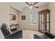 Comfortable living room with ceiling fan, tile floors, and traditional furnishings at 3206 Sonesta Ct # A, Clermont, FL 34711