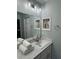 Bright bathroom with storage and modern fixtures at 32222 Summertree Circle, Leesburg, FL 34748