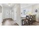 Kitchen area with breakfast bar and a view of the front door and entryway at 32222 Summertree Circle, Leesburg, FL 34748