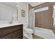 Bathroom with decorative wall tile, a shower and tub combo, and a modern vanity at 3262 Dalkeith Ter, The Villages, FL 32163