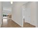 Hallway leading to bedrooms and living room with tile floor at 3262 Dalkeith Ter, The Villages, FL 32163