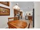 Spacious kitchen featuring stainless steel appliances, tile floors, and wood cabinetry at 3262 Dalkeith Ter, The Villages, FL 32163