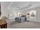 Spacious main bedroom features decorative ceiling, carpet flooring, and lots of natural light at 3262 Dalkeith Ter, The Villages, FL 32163