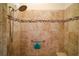 Walk-in shower with tile surround at 3426 Boardroom Trl, The Villages, FL 32163