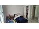 Cozy bedroom featuring a closet, natural light and a well-designed floor at 42329 Chinaberry St, Eustis, FL 32736