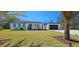 Beautiful new home with a well manicured lawn and separate garage at 42329 Chinaberry St, Eustis, FL 32736
