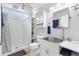 Bathroom featuring a walk-in shower, white cabinets, and a modern sink at 4552 Cr 300, Lake Panasoffkee, FL 33538