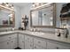 Bright bathroom featuring double sinks, ample counter space, and great lighting at 50 Pecan Run Crse, Ocala, FL 34472