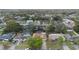 Wide aerial view of a neighborhood featuring single-Gathering homes with green trees at 516 Spring Oaks Blvd, Altamonte Springs, FL 32714