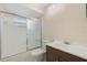 A clean bathroom featuring a shower over tub, a vanity with a sink and a toilet at 516 Spring Oaks Blvd, Altamonte Springs, FL 32714