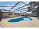 A backyard pool, screened in and surrounded by a concrete deck, ideal for leisure and entertaining at 516 Spring Oaks Blvd, Altamonte Springs, FL 32714