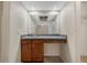 Ensuite vanity area with granite countertops, wood cabinetry, and a large mirror at 516 Spring Oaks Blvd, Altamonte Springs, FL 32714