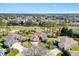 Stunning aerial view showcasing the home's location on a lush golf course community at 7885 Se 166Th Hibernia Ln, The Villages, FL 32162