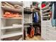 Walk-in closet with custom shelving for storage at 7885 Se 166Th Hibernia Ln, The Villages, FL 32162