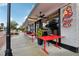 Charming restaurant exterior with outdoor seating and prominent signage for 'Breakfast & Lunch' at 909 Egrets Landing Way, Groveland, FL 34736