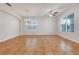 Spacious living room with tile floors, a chandelier, and lots of natural light at 909 Egrets Landing Way, Groveland, FL 34736