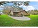 Charming single-story home featuring mature landscaping and beautiful curb appeal at 10122 Canterbury Dr, Leesburg, FL 34788