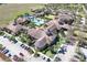 Aerial view of the impressive community center, pool, and grounds at 112 Flame Vine Way, Groveland, FL 34736