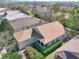 Inviting single story home features a covered porch and well manicured landscaping at 112 Flame Vine Way, Groveland, FL 34736
