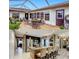 Spacious screened patio with ample seating, perfect for enjoying the outdoors in comfort and style at 1131 Apple Ter, Leesburg, FL 34748