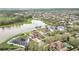 Aerial view of the home showing its location relative to nearby lake and community at 11579 Acosta Ave, Orlando, FL 32836