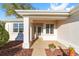 Inviting front porch with decorative planters and views of the landscaped yard at 13142 Se 93Rd Terrace Rd, Summerfield, FL 34491