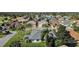 The aerial view showcases the lush landscaping and proximity to community amenities at 1367 Honea Path, The Villages, FL 32162