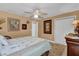 Well-lit bedroom features a large window and ample closet space at 1367 Honea Path, The Villages, FL 32162