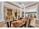 Formal dining room with elegant table setting, neutral walls and ample natural light at 1367 Honea Path, The Villages, FL 32162