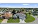 Beautifully landscaped home with a well-manicured lawn and a three-car garage at 1367 Honea Path, The Villages, FL 32162