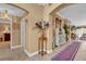 Elegant foyer featuring neutral walls, tiled floors, and a decorative rug at 1367 Honea Path, The Villages, FL 32162